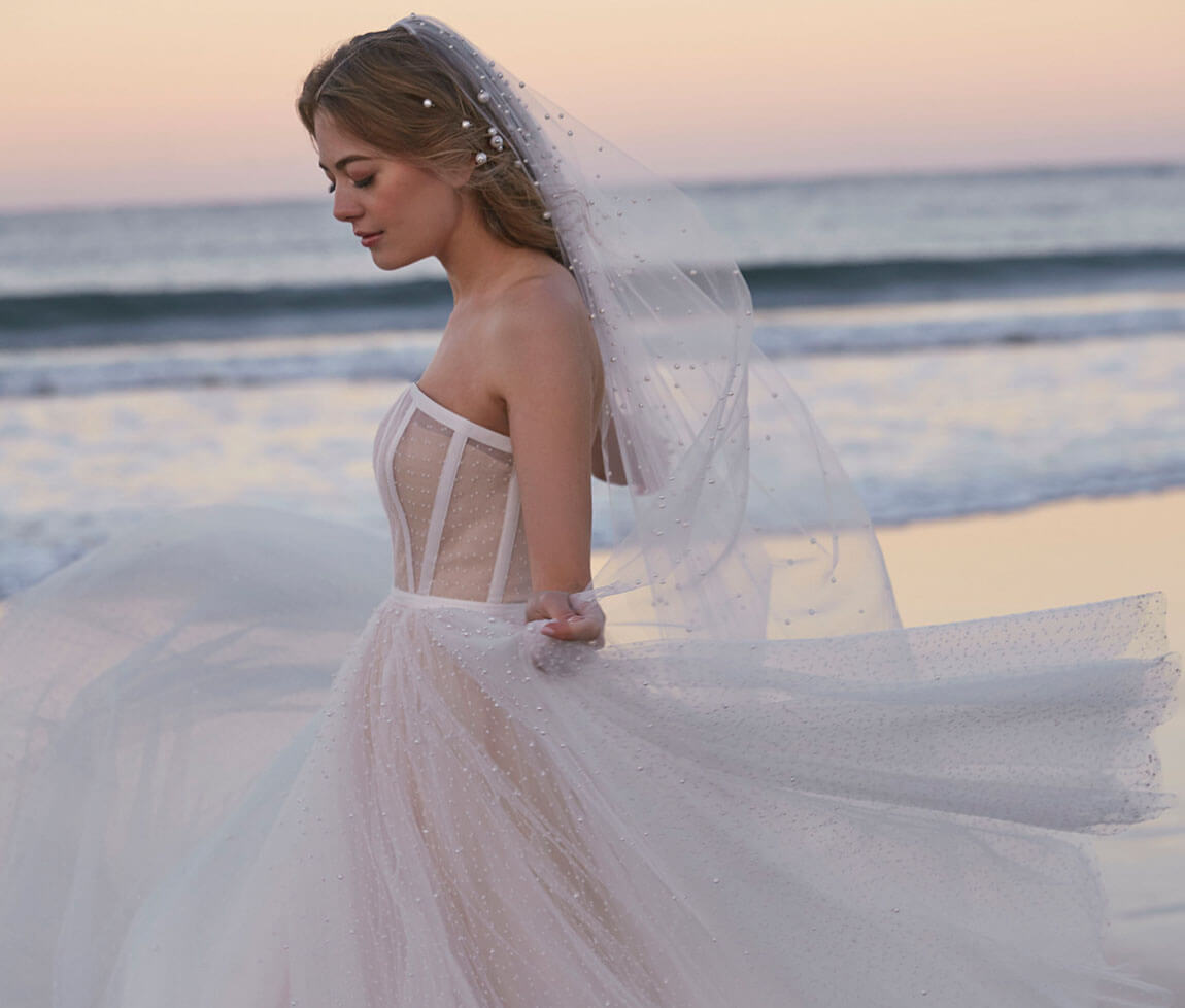 Photo of Model wearing a bridal gown by Watters