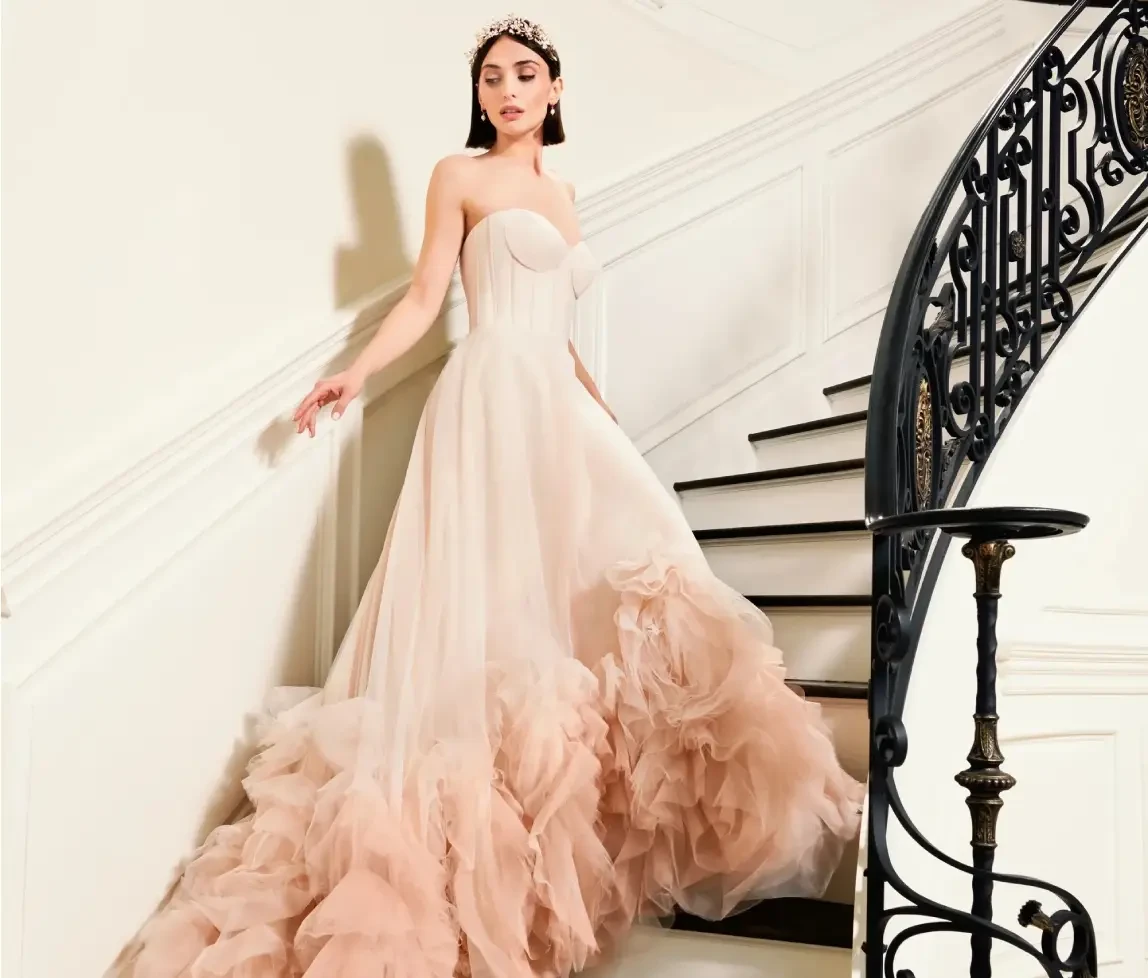 Photo of Model wearing a bridal gown by Kelly Faetanini