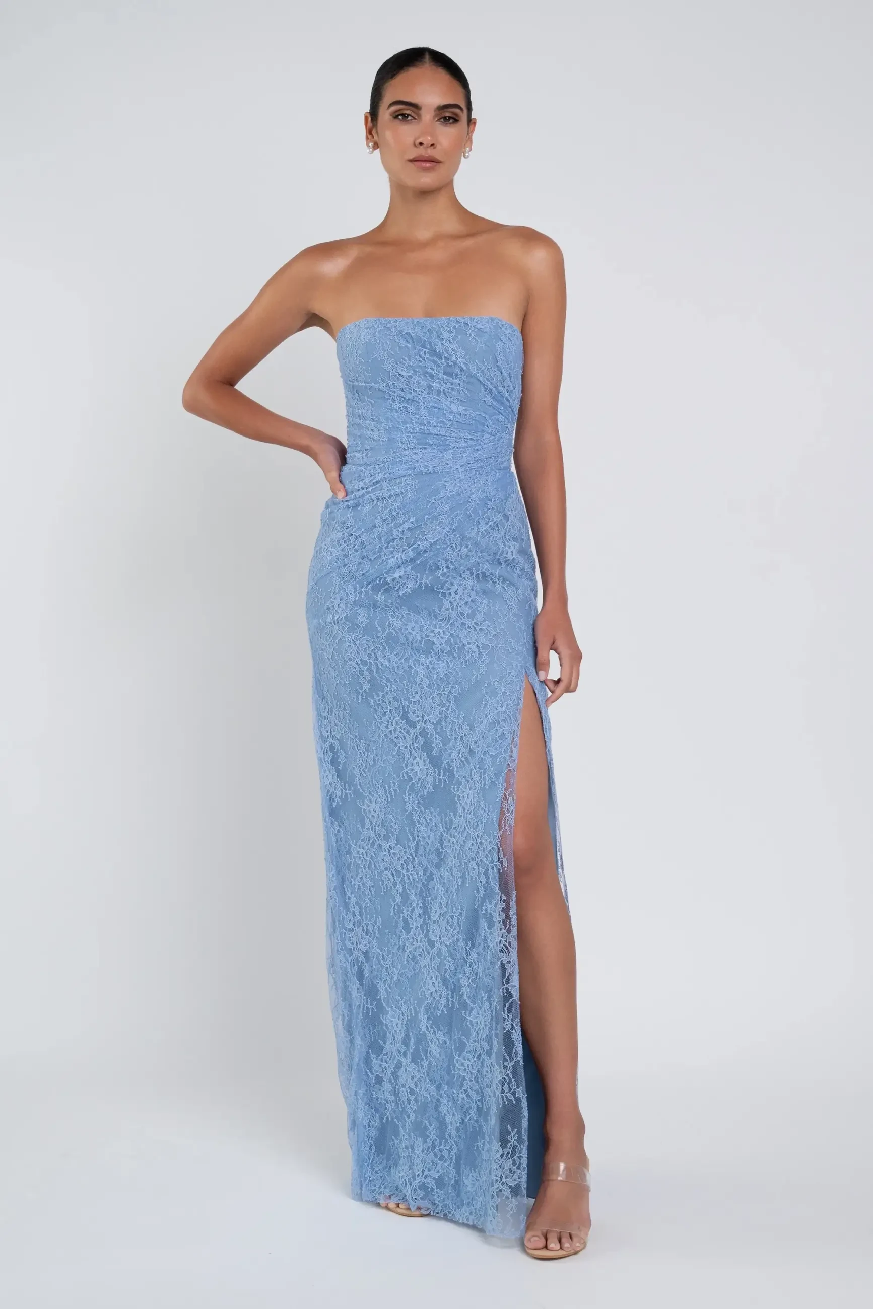 model is wearing a blue strapless bridesmaid dress