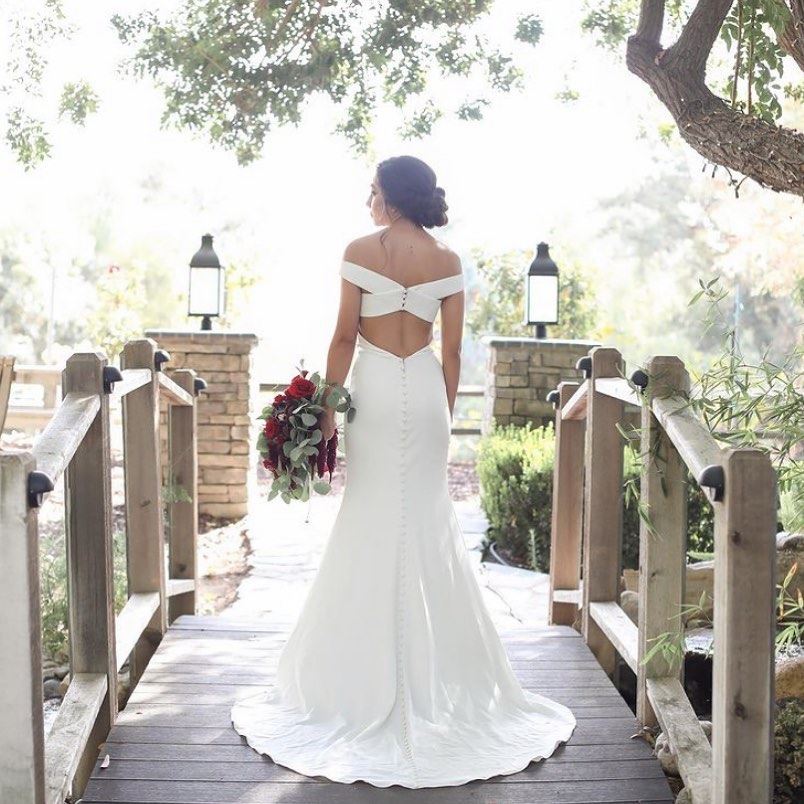 Сouple wearing a white dress